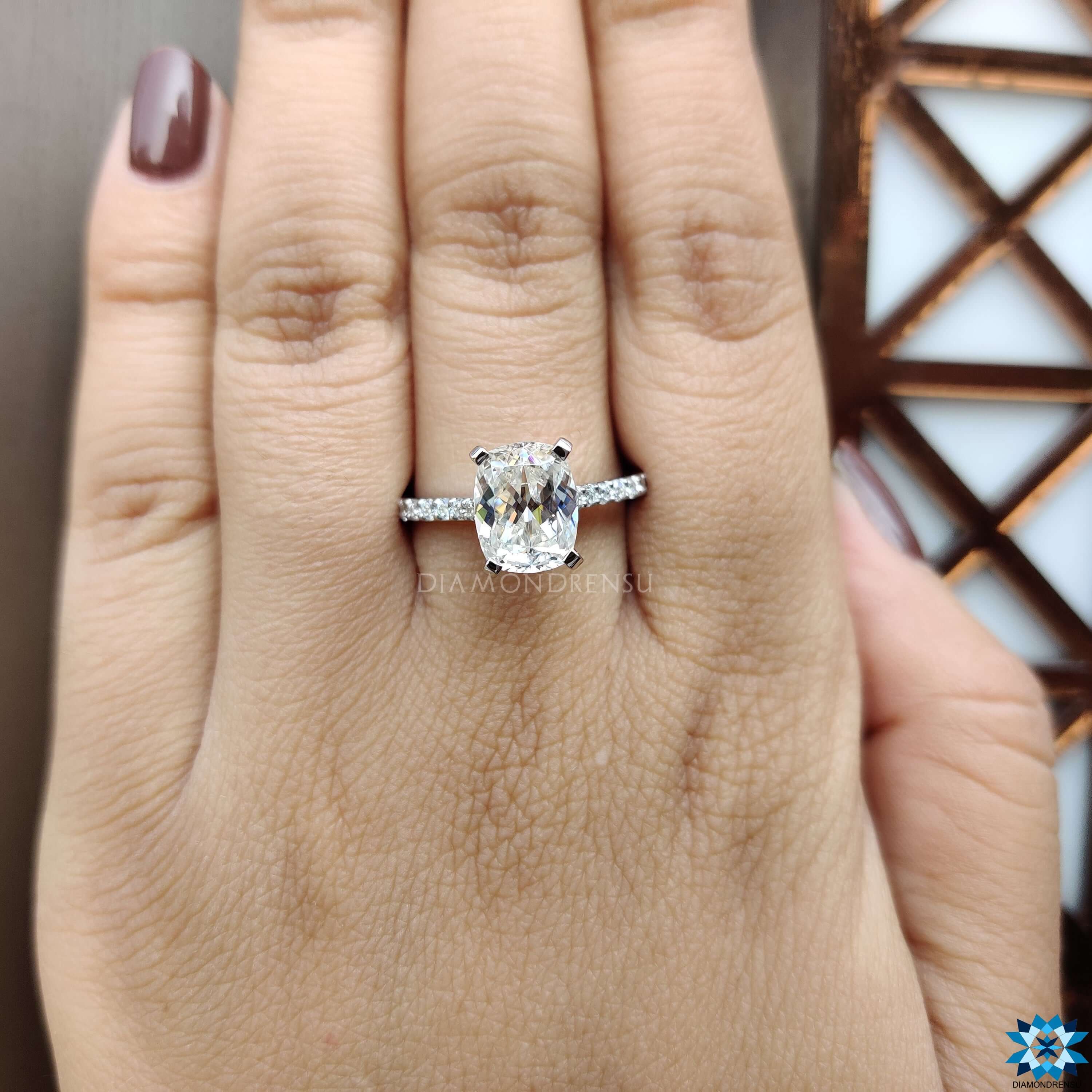 Pave moissanite engagement ring in white gold with custom details.