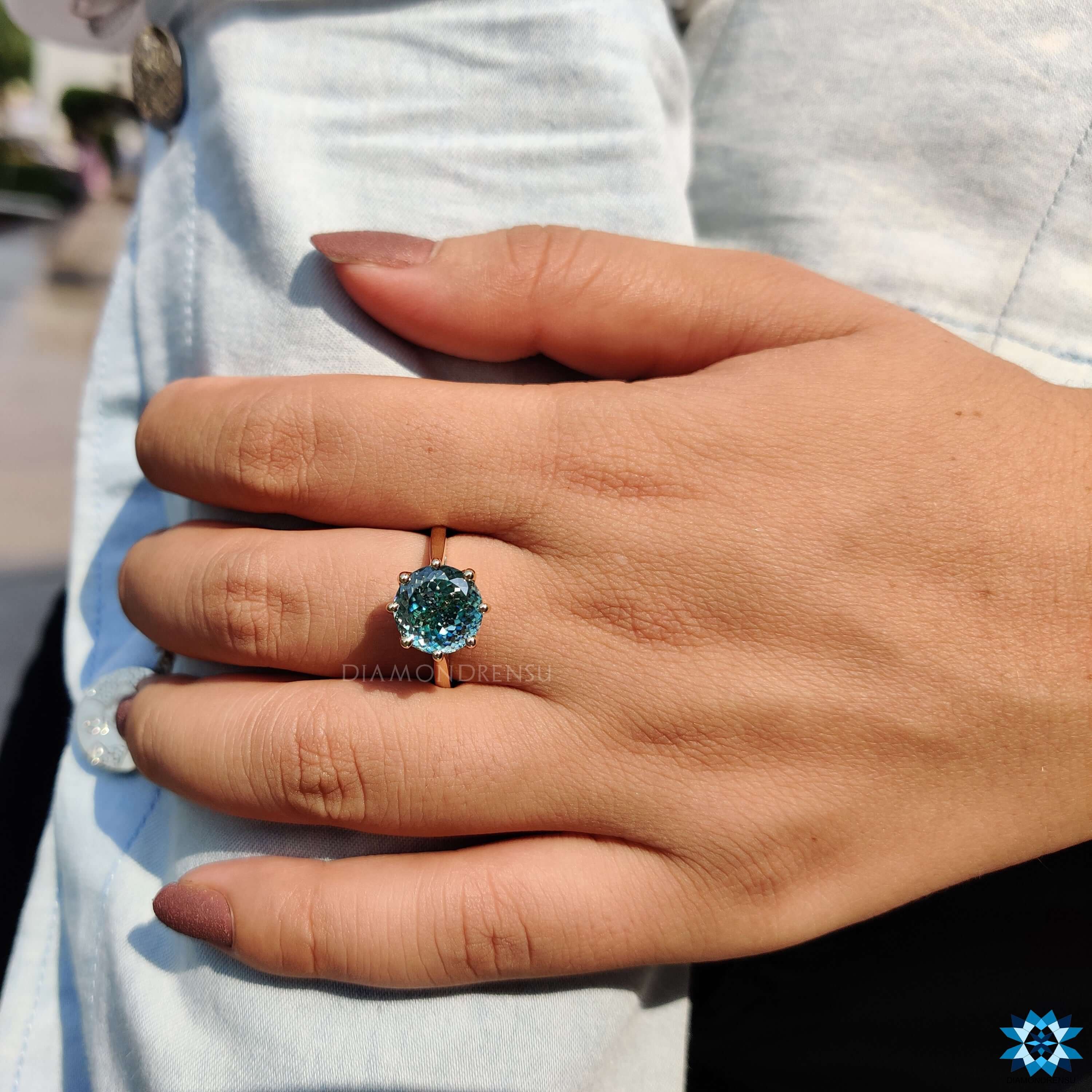 Moissanite ring featuring a Portuguese cut stone.