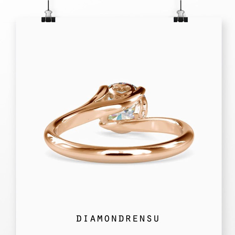 Handmade ring with round diamond and 4 prong setting.