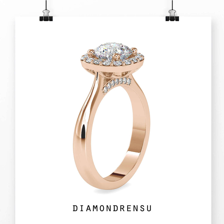 Designer ring with round prong set halo and lab grown centre.