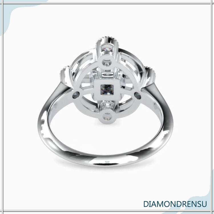 Custom engagement ring with princess and round diamond mix.