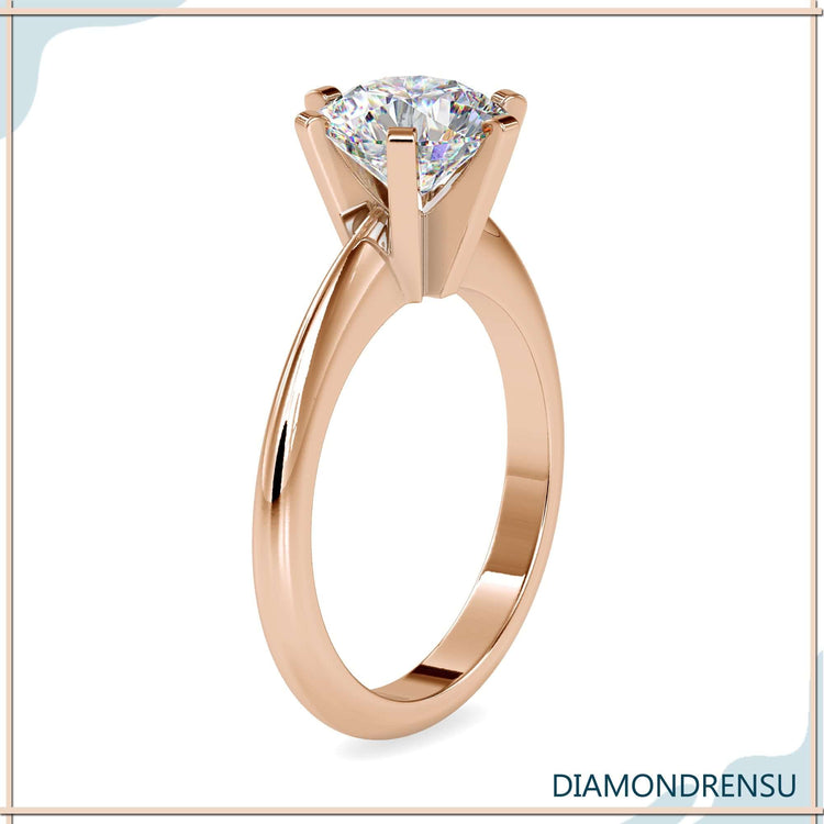 Buy engagement ring with classic six prong solitaire mount.