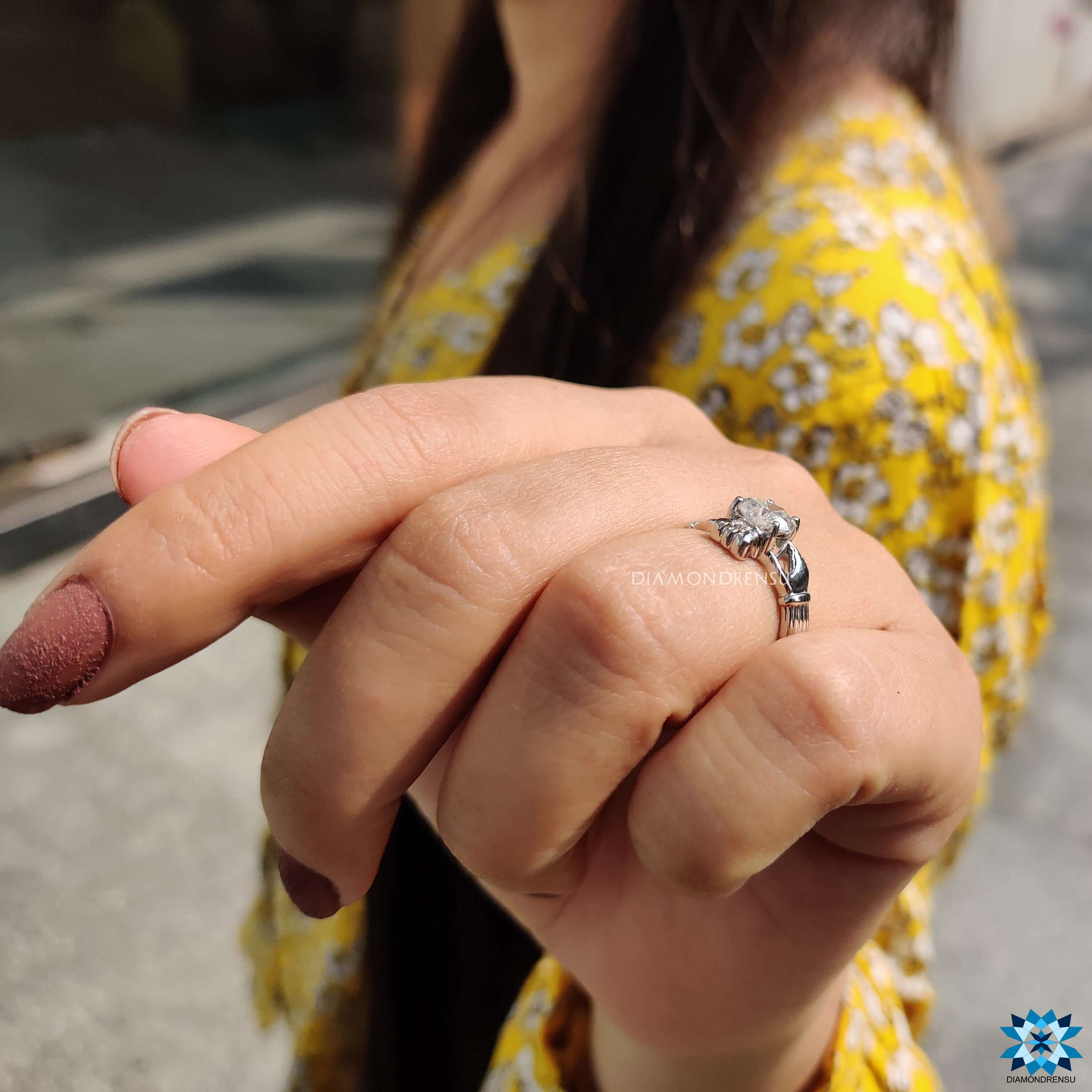 Heart shaped moissanite ring with prong setting.