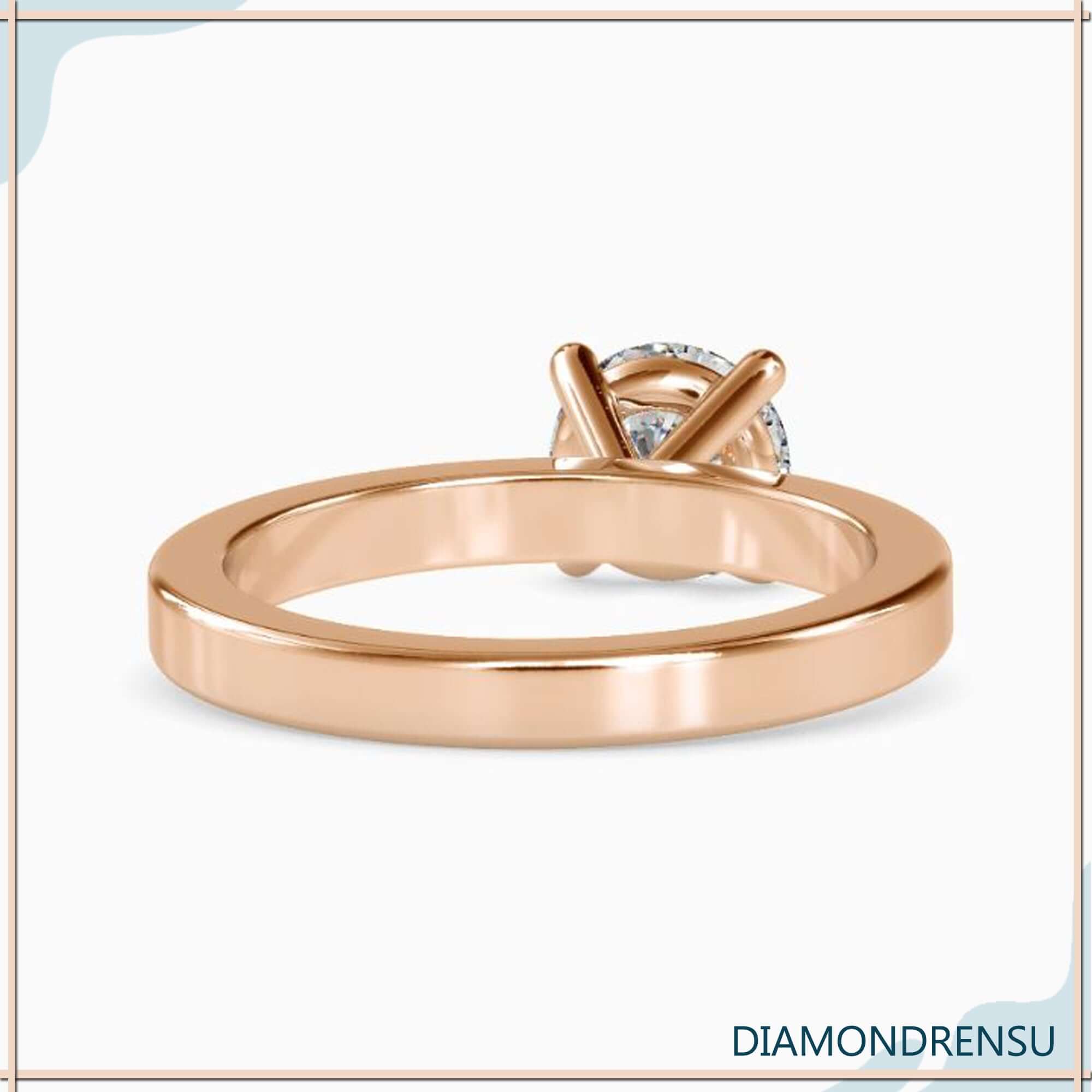 Yellow gold ring with diamond solitaire, handmade finish.