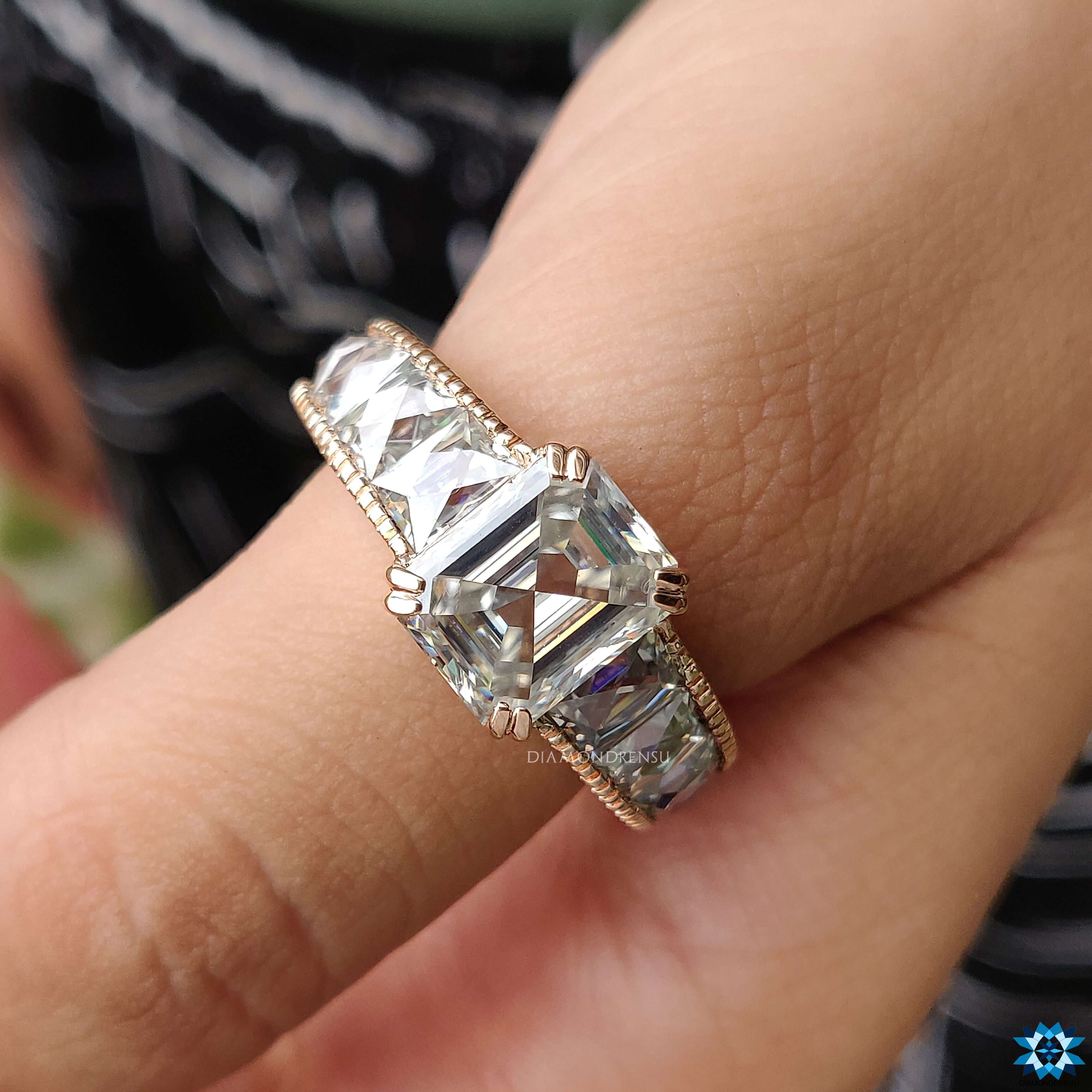 Custom emerald cut moissanite ring.
