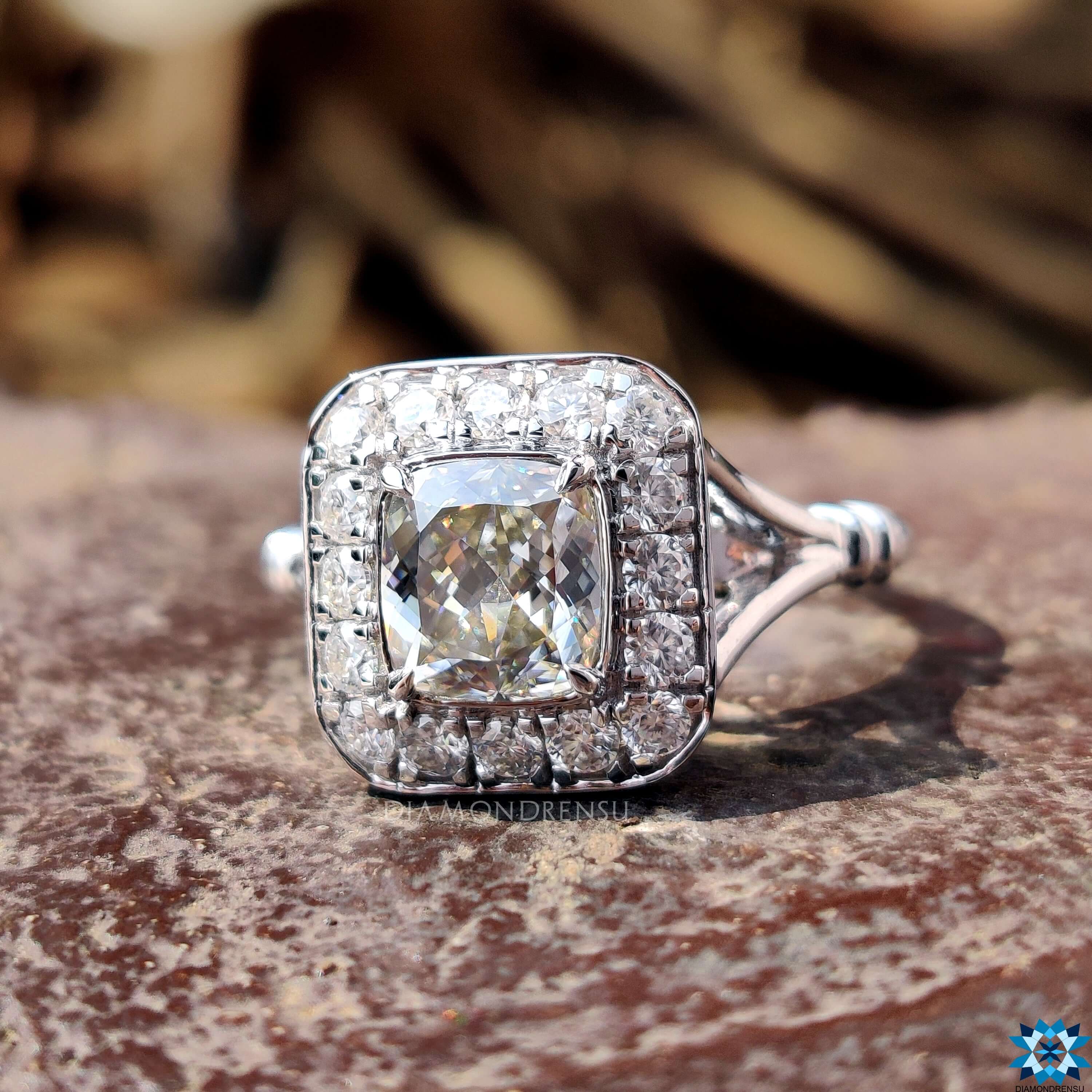 Split shank ring with white gold moissanite.