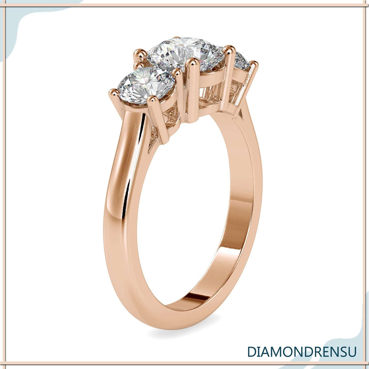 Buy diamond ring with white gold band and round cut stones.