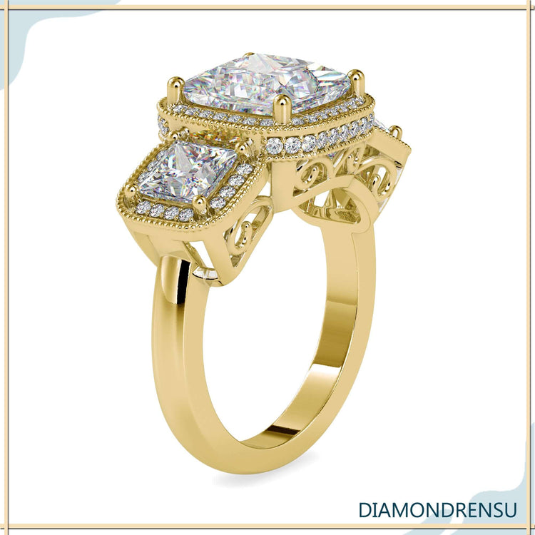 Lab grown diamond ring with four prong setting and halo accent.