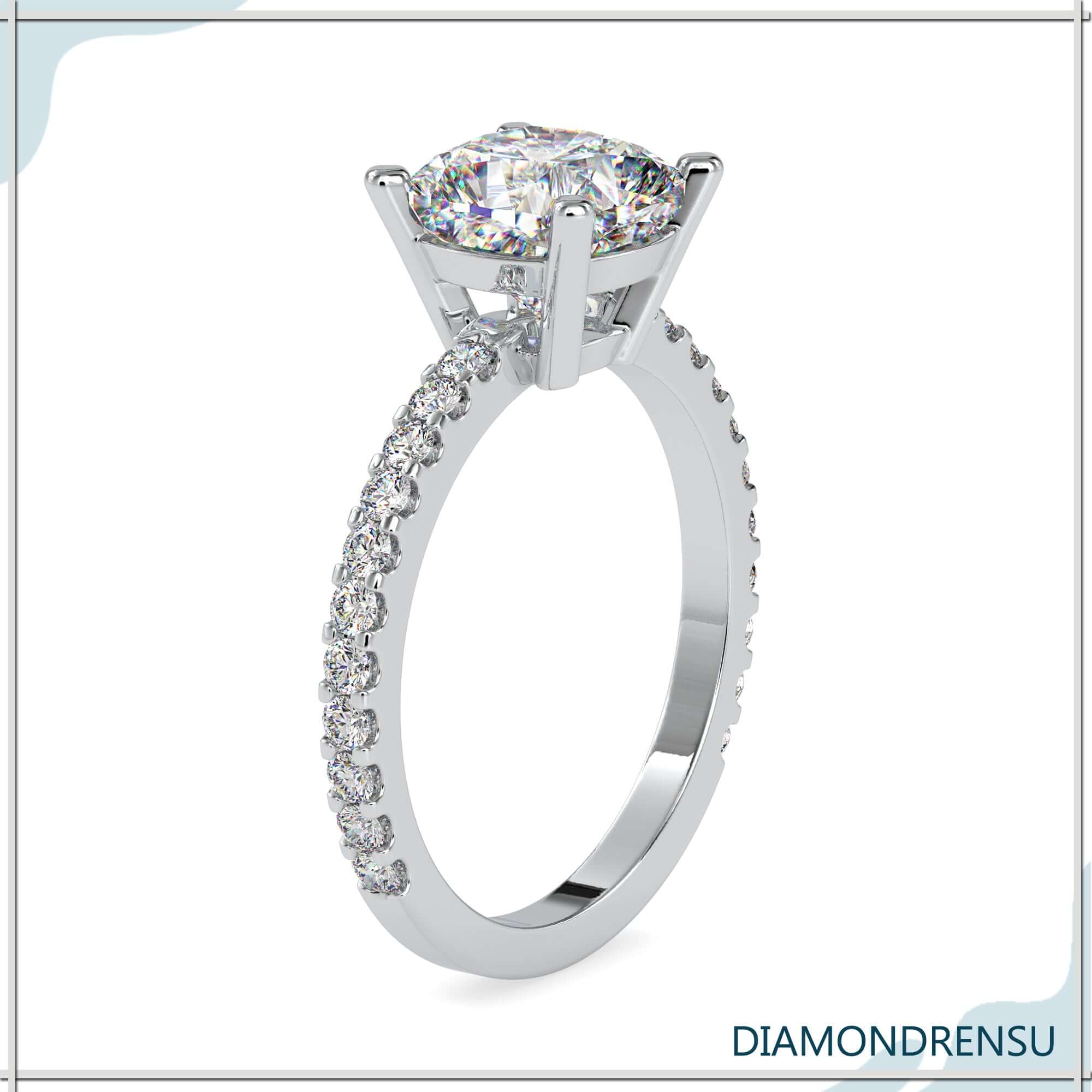 Lab grown diamond ring with basket setting and pave band.