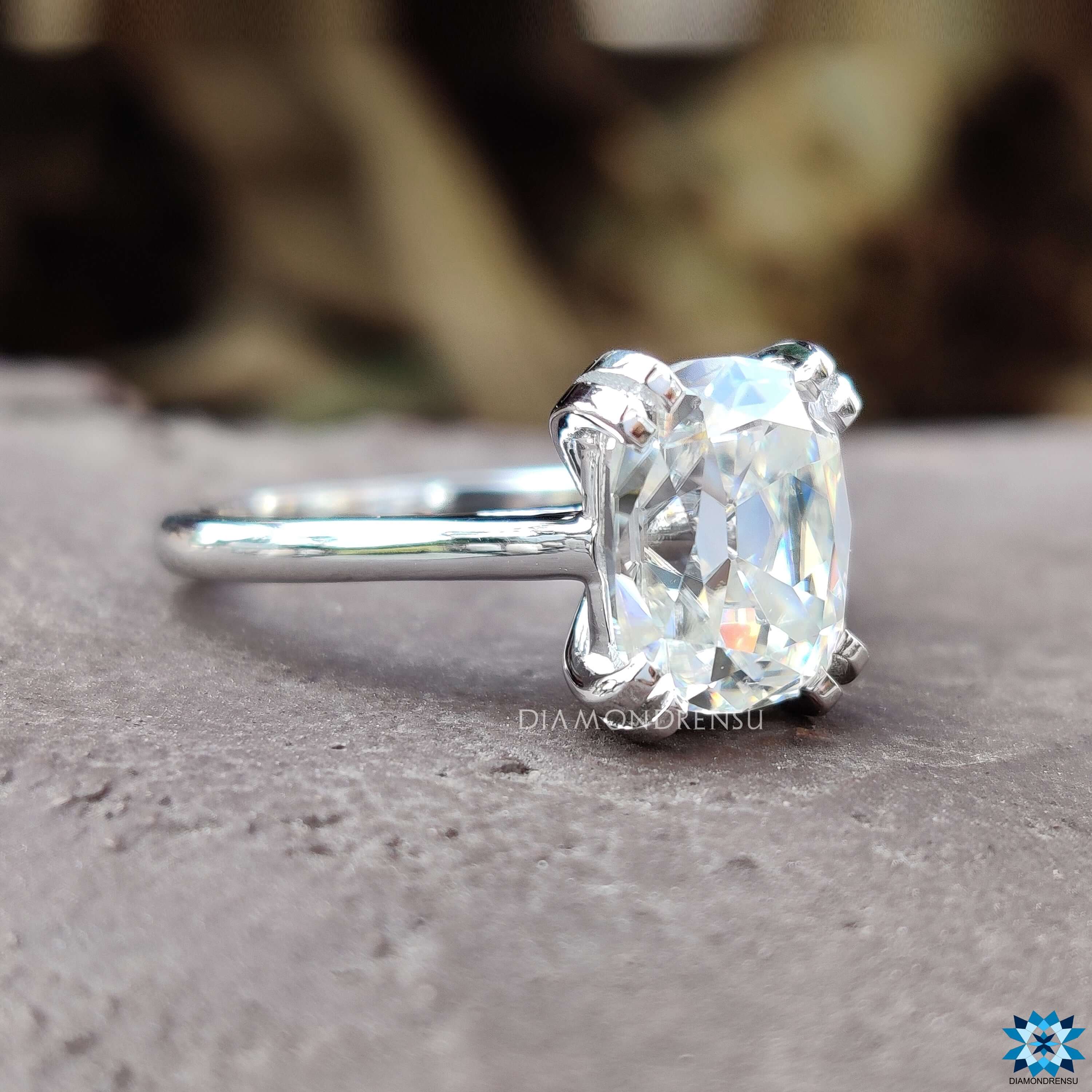 Handmade engagement ring with elongated cushion moissanite.