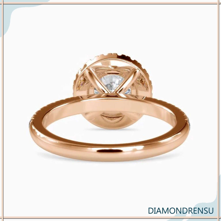 Lab grown diamond engagement ring with 4 prong halo.