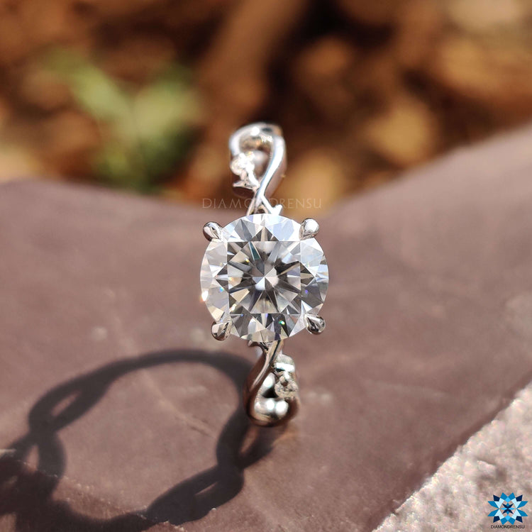 Handmade round cut engagement ring.
