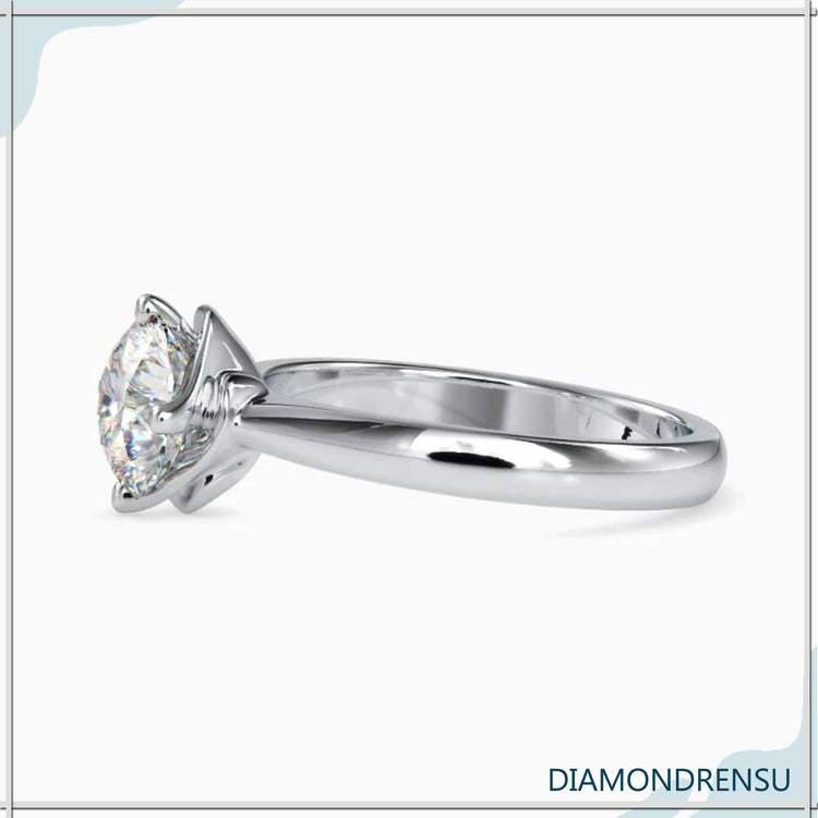 Custom design ring with lab grown solitaire diamond.