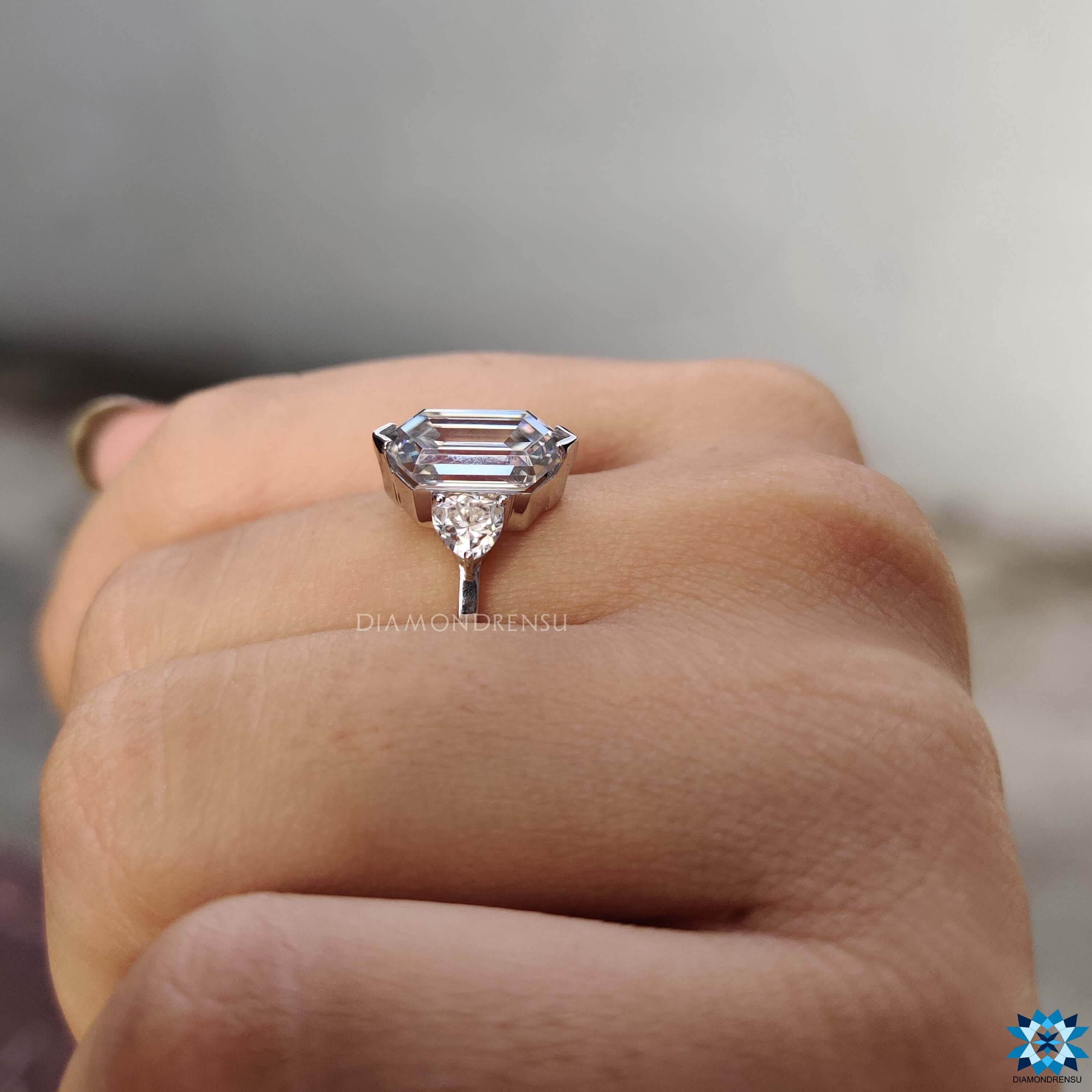 Diamondrensu UK hexagon cut moissanite ring with prong setting.