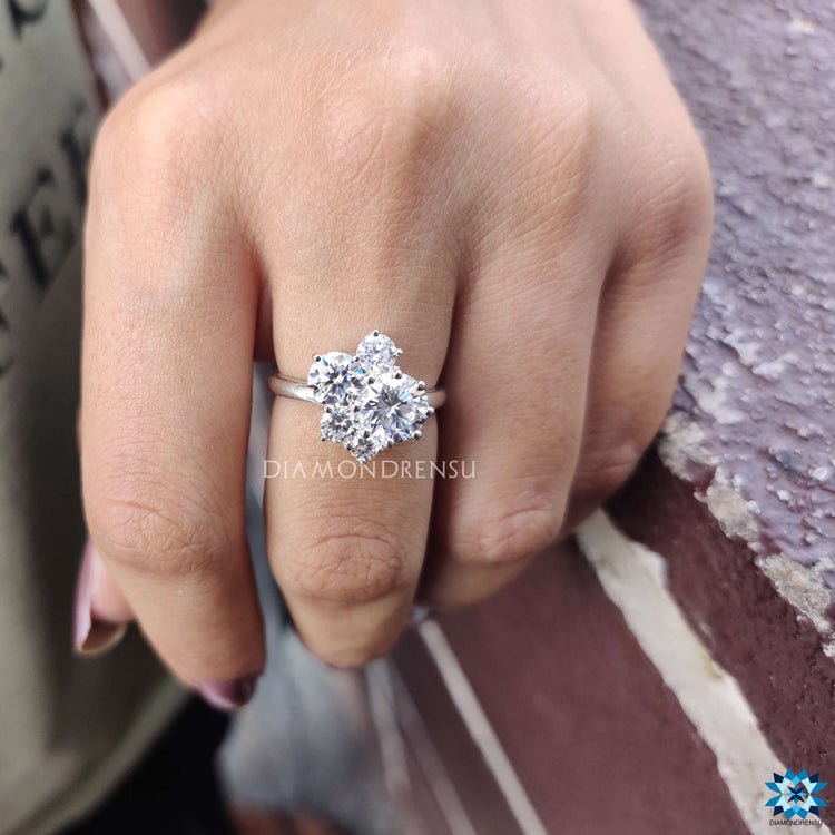 Round cut moissanite band crafted in a vintage-inspired five stone design.