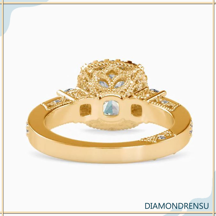 UK engagement ring with white gold and round diamond halo.