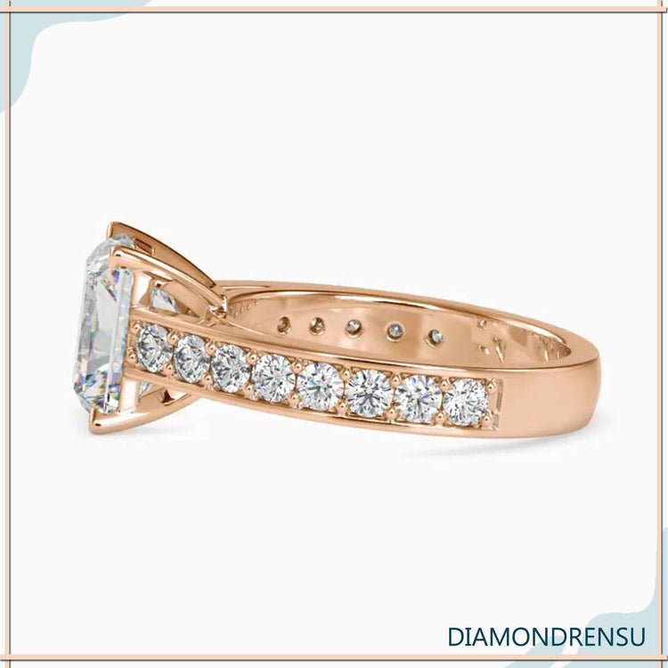 Yellow gold engagement ring with custom pave band.