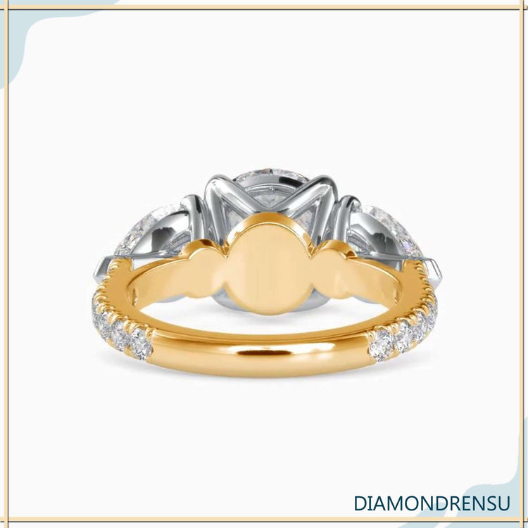 Round diamond ring with designer handmade features.