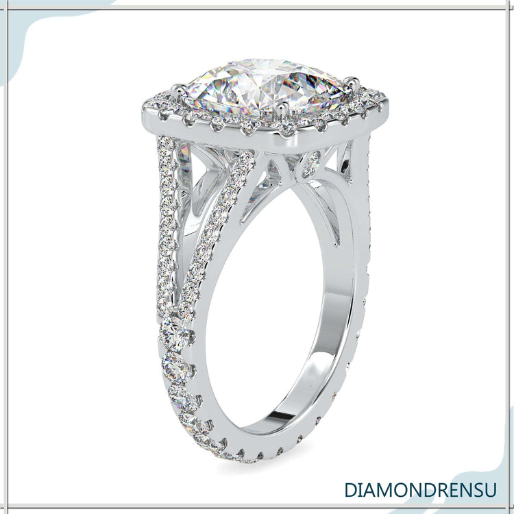 Buy diamond ring with halo and split shank styling.