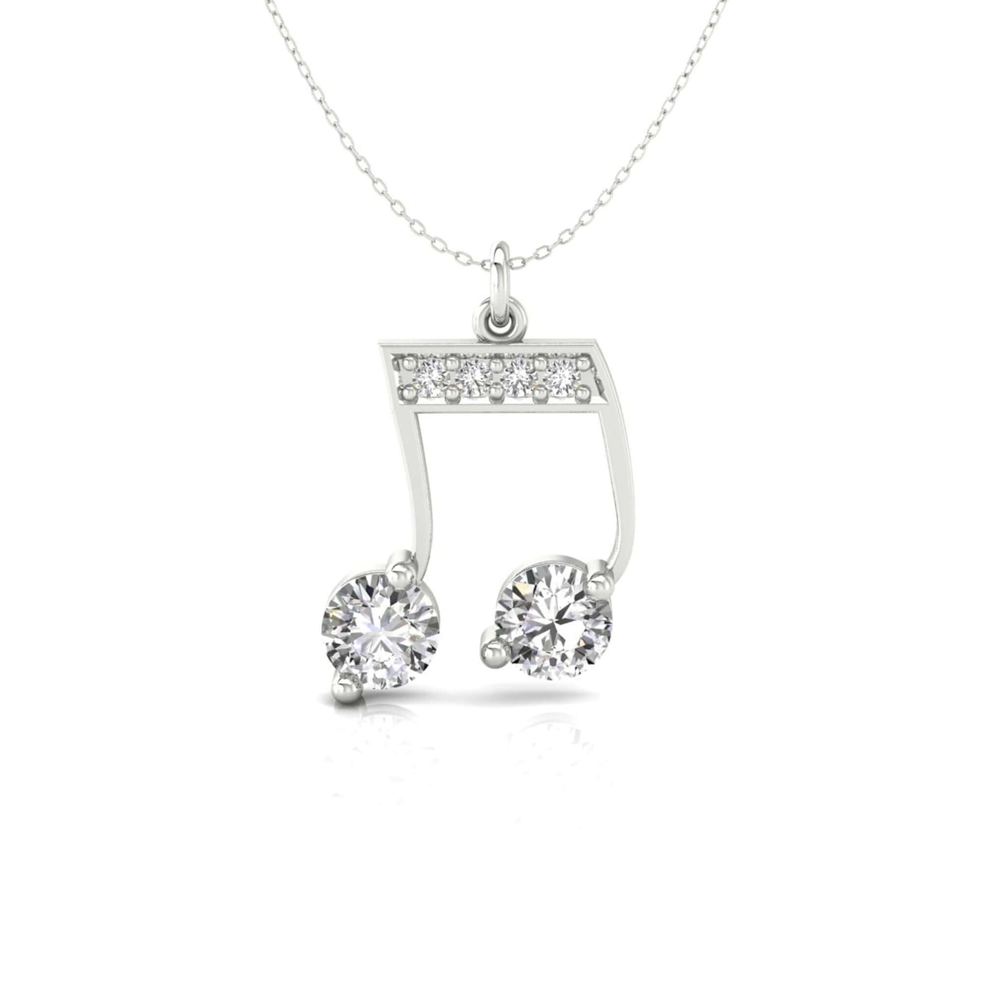 UK diamond pendant paired with music note gold pendant.