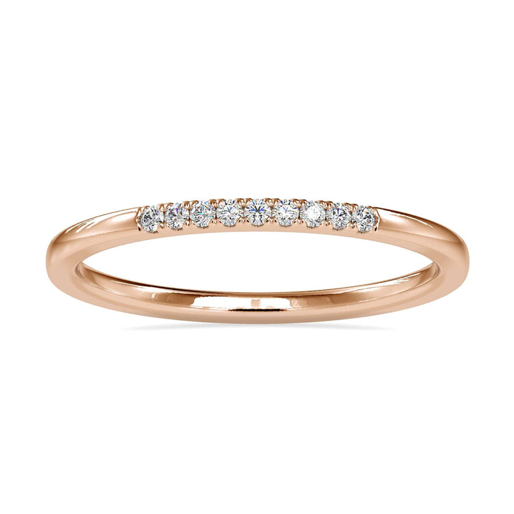 Round cut diamond gold band with 1/4 eternity style.