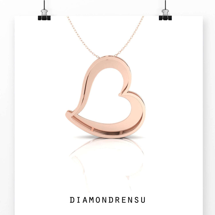 Lab grown diamond heart pendant in classic gold finish.