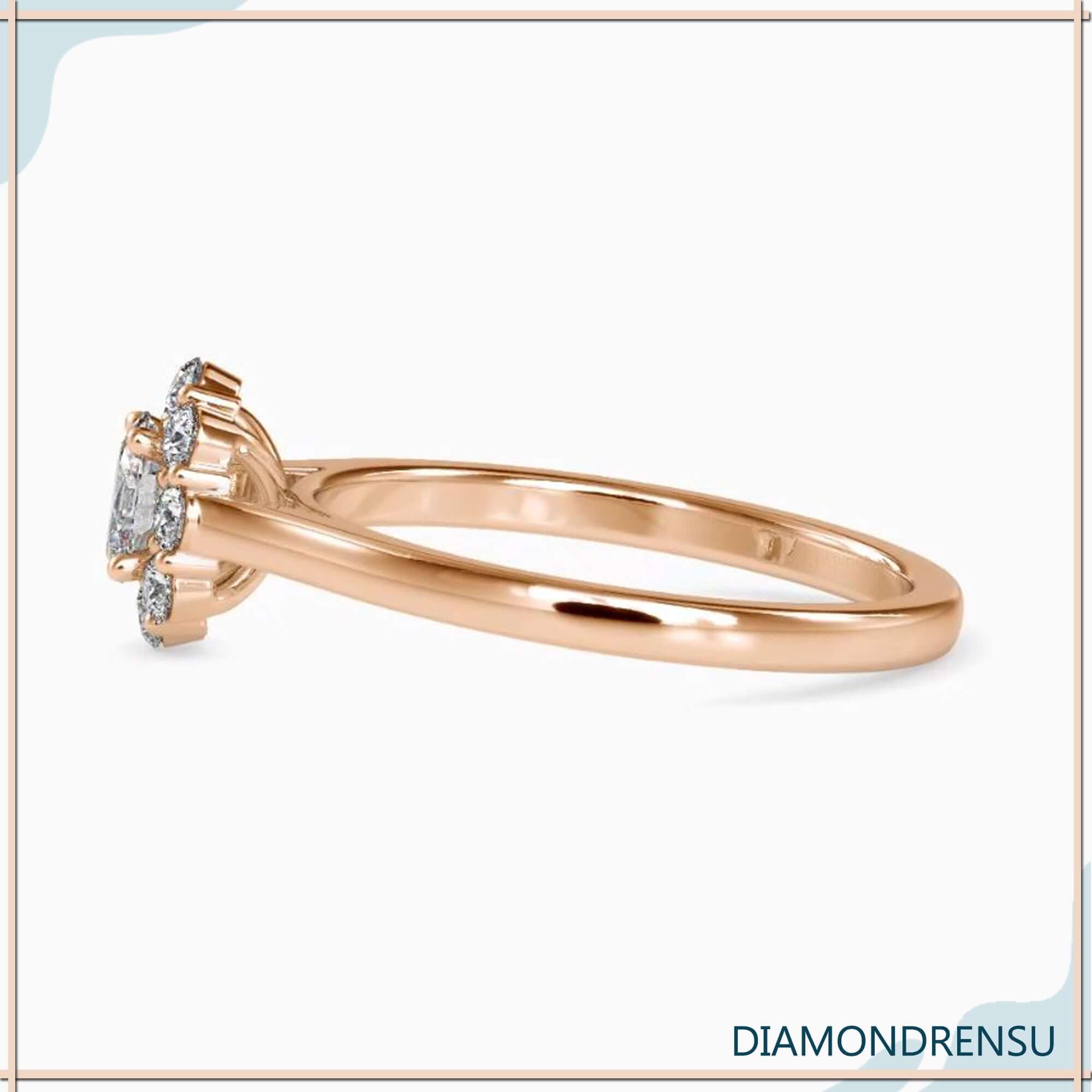 Custom engagement ring with oval cluster and cathedral shank.