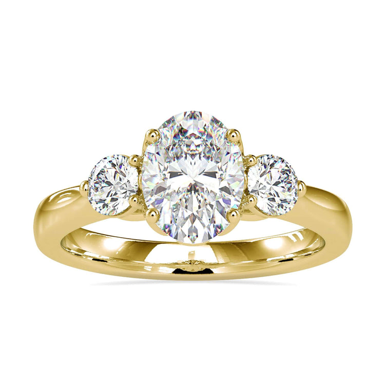 Three stone engagement ring with oval centre diamond.