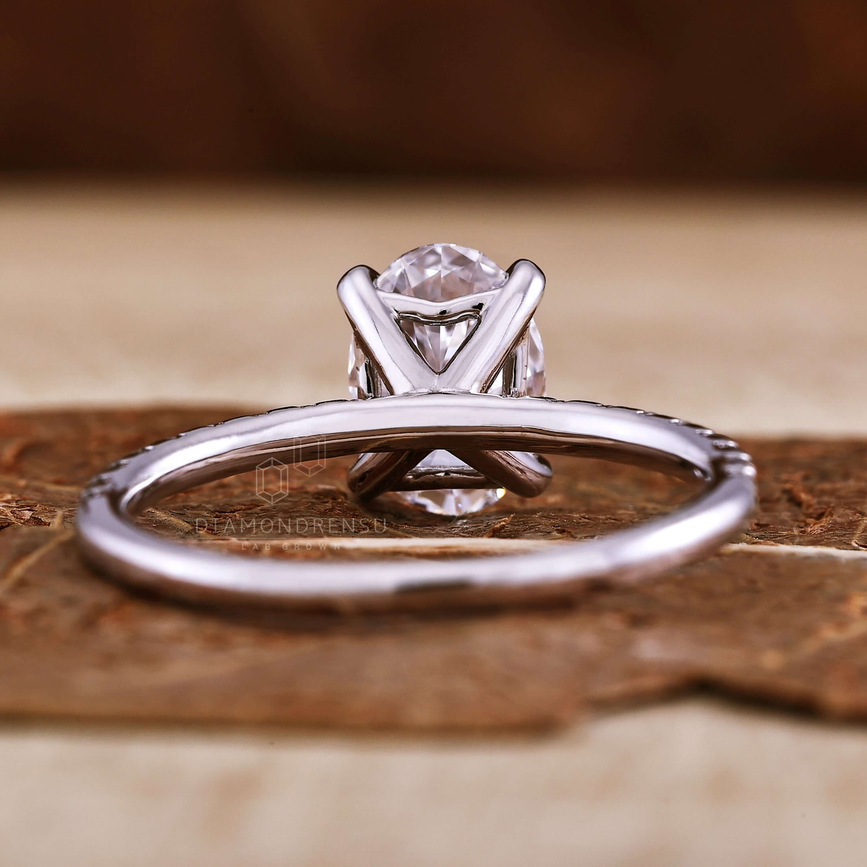 Oval engagement ring with pave set diamonds, perfect for engagement ring for women seeking sophistication.