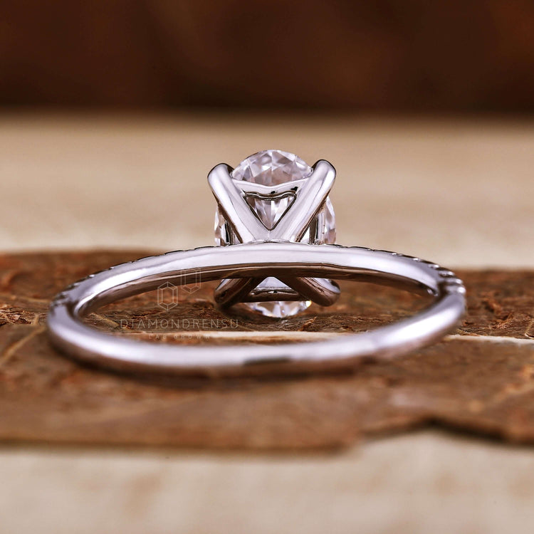 Oval engagement ring with pave set diamonds, perfect for engagement ring for women seeking sophistication.