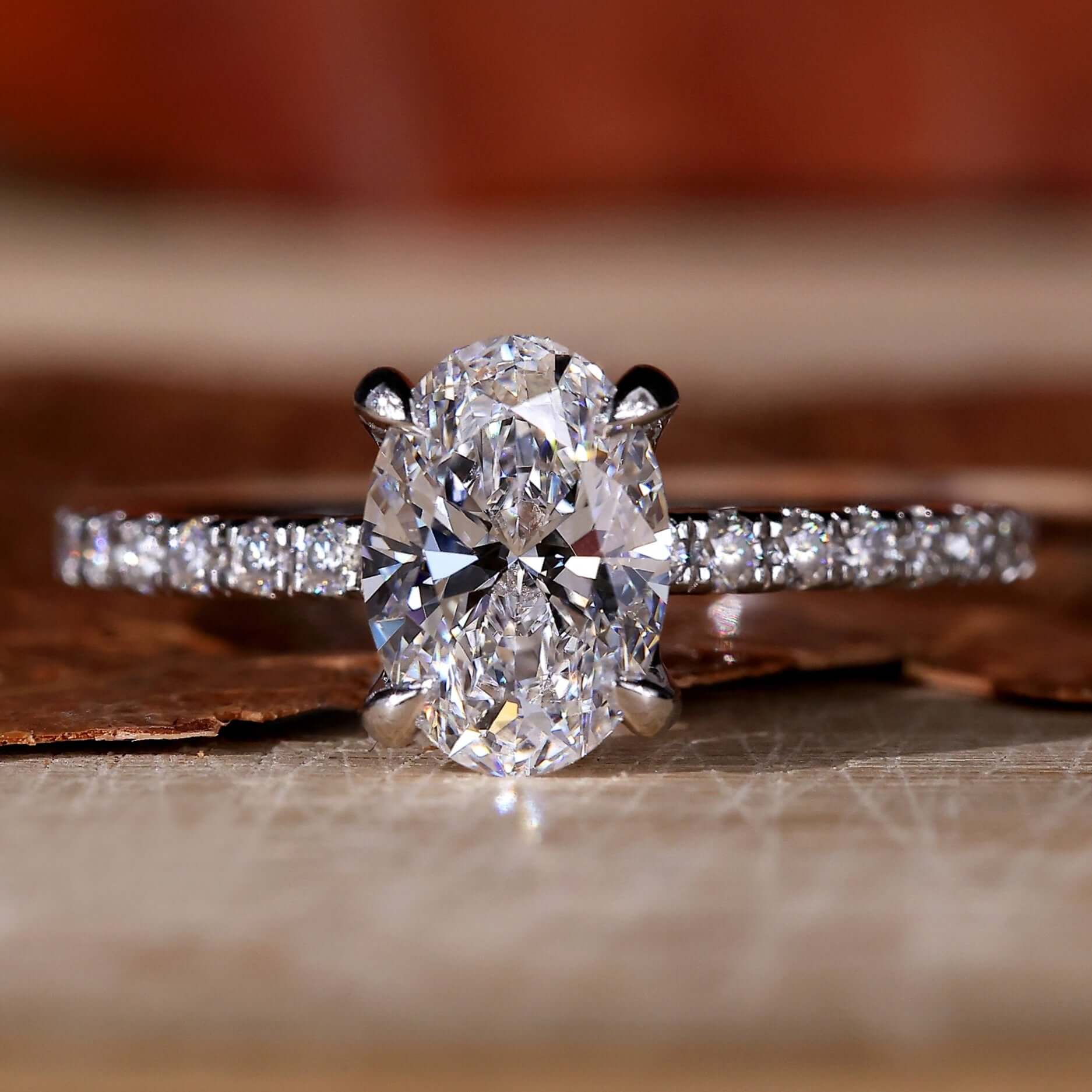 1 carat oval diamond ring with a stunning 4 prong claw setting, perfect for elegant proposals.