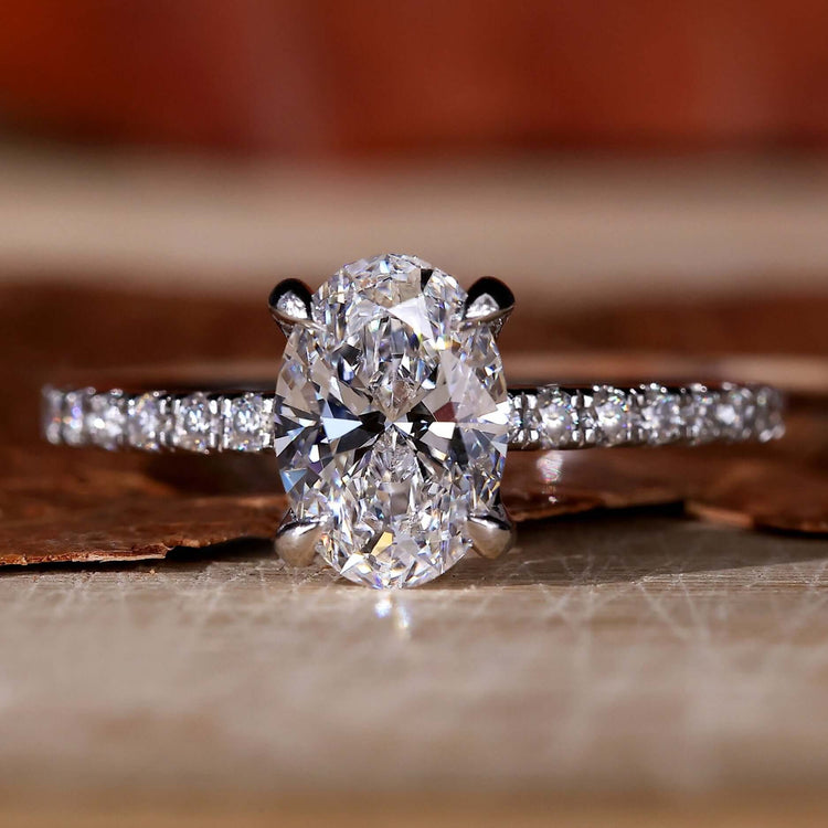 1 carat oval diamond ring with a stunning 4 prong claw setting, perfect for elegant proposals.