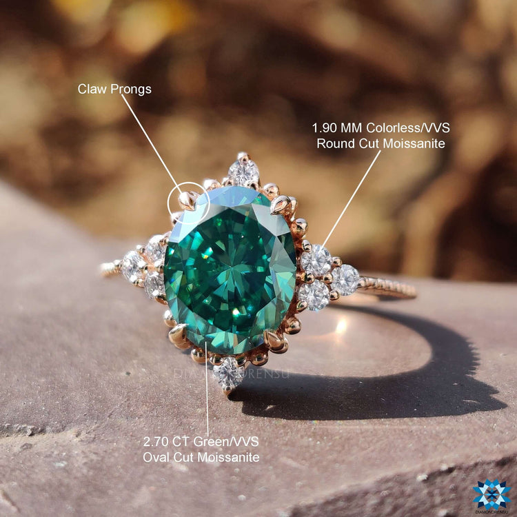 Buy moissanite ring with oval center and round side stones.