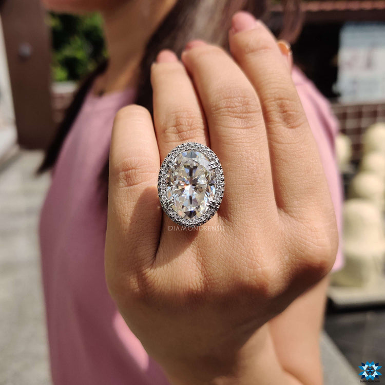 Handmade ring featuring oval moissanite center.