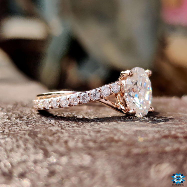 Custom engagement ring featuring oval moissanite.