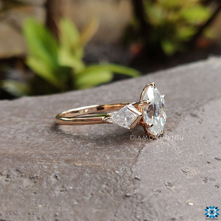 Claw prong setting ring with European oval cut moissanite.