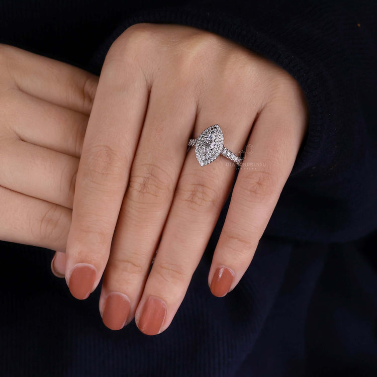 Marquise engagement ring featuring a cathedral setting for a timeless
and elegant look.