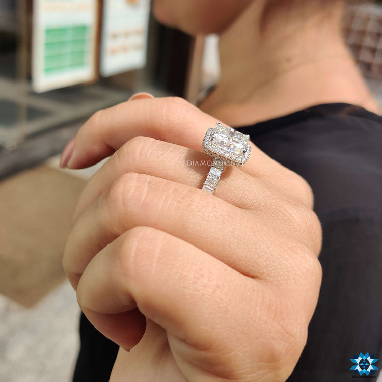 Square moissanite ring with halo and hidden halo detailing.
