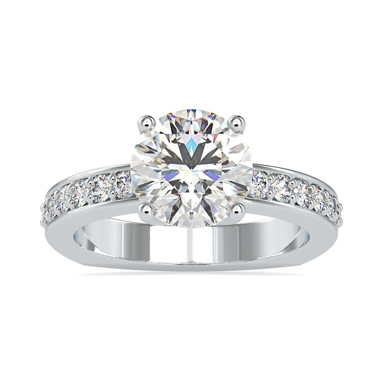 Channel set ring with sparkling round cut diamonds in a white gold finish.
