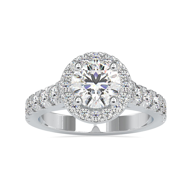 4 prong setting ring with round diamond and pave halo.