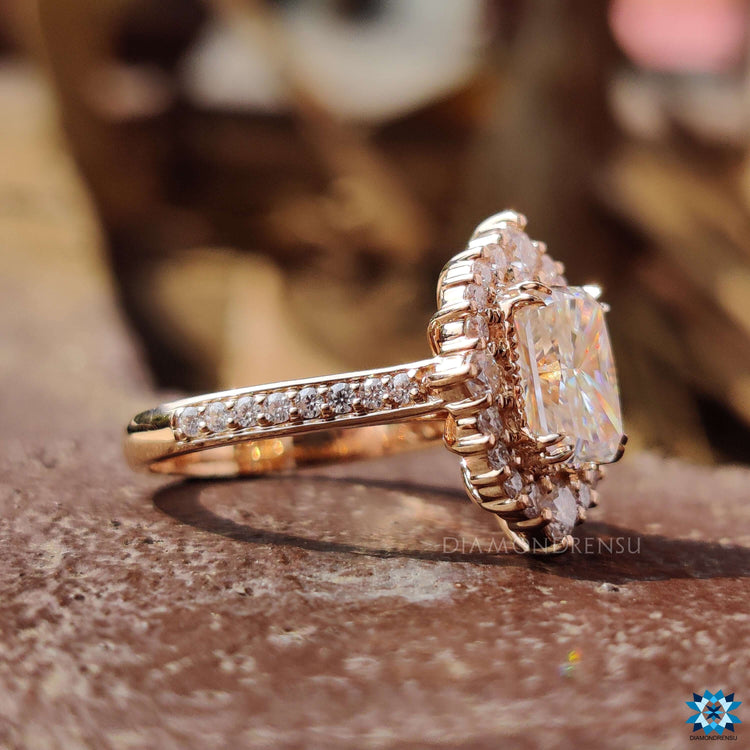 Handmade radiant moissanite engagement ring with prong mount.