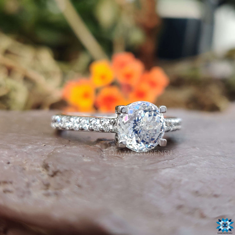 Handmade white gold ring with Portuguese cut moissanite.