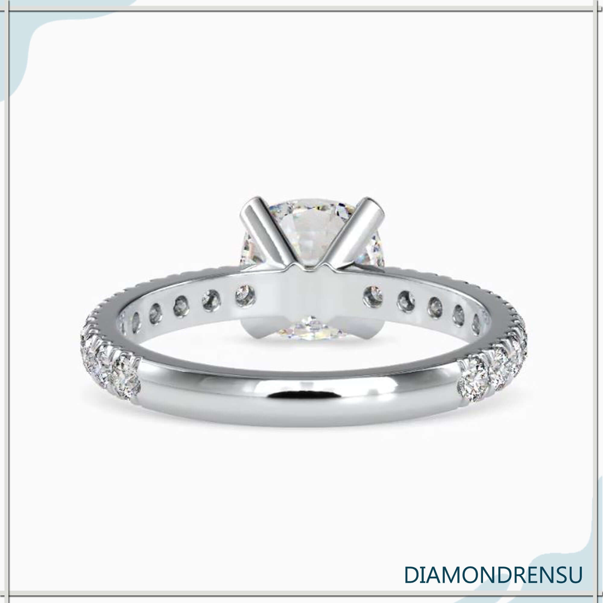 Prong setting ring with IGI certified diamond centre.