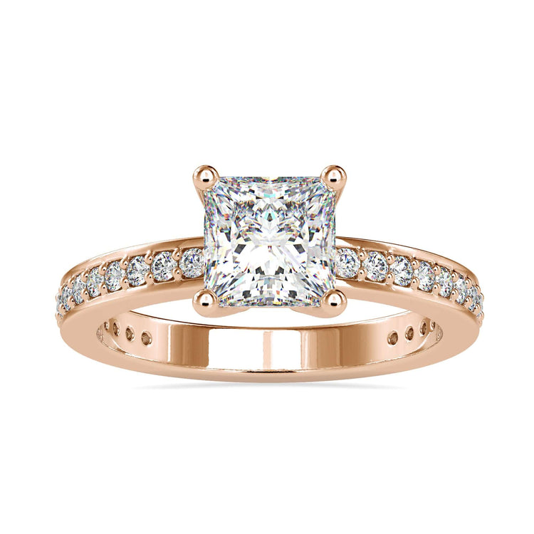 Simple diamond ring with princess cut and channel set.
