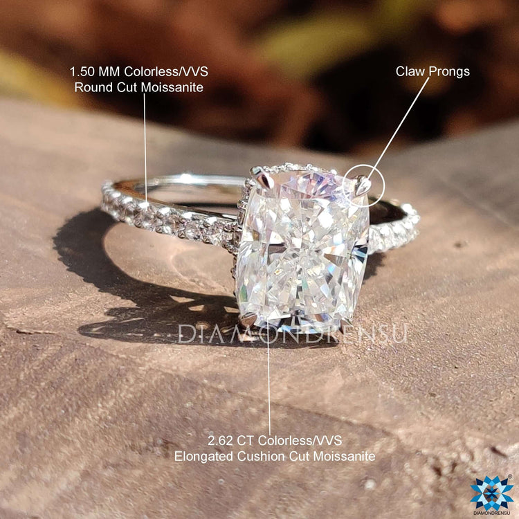 Elegant white gold pavé ring with moissanite stone.