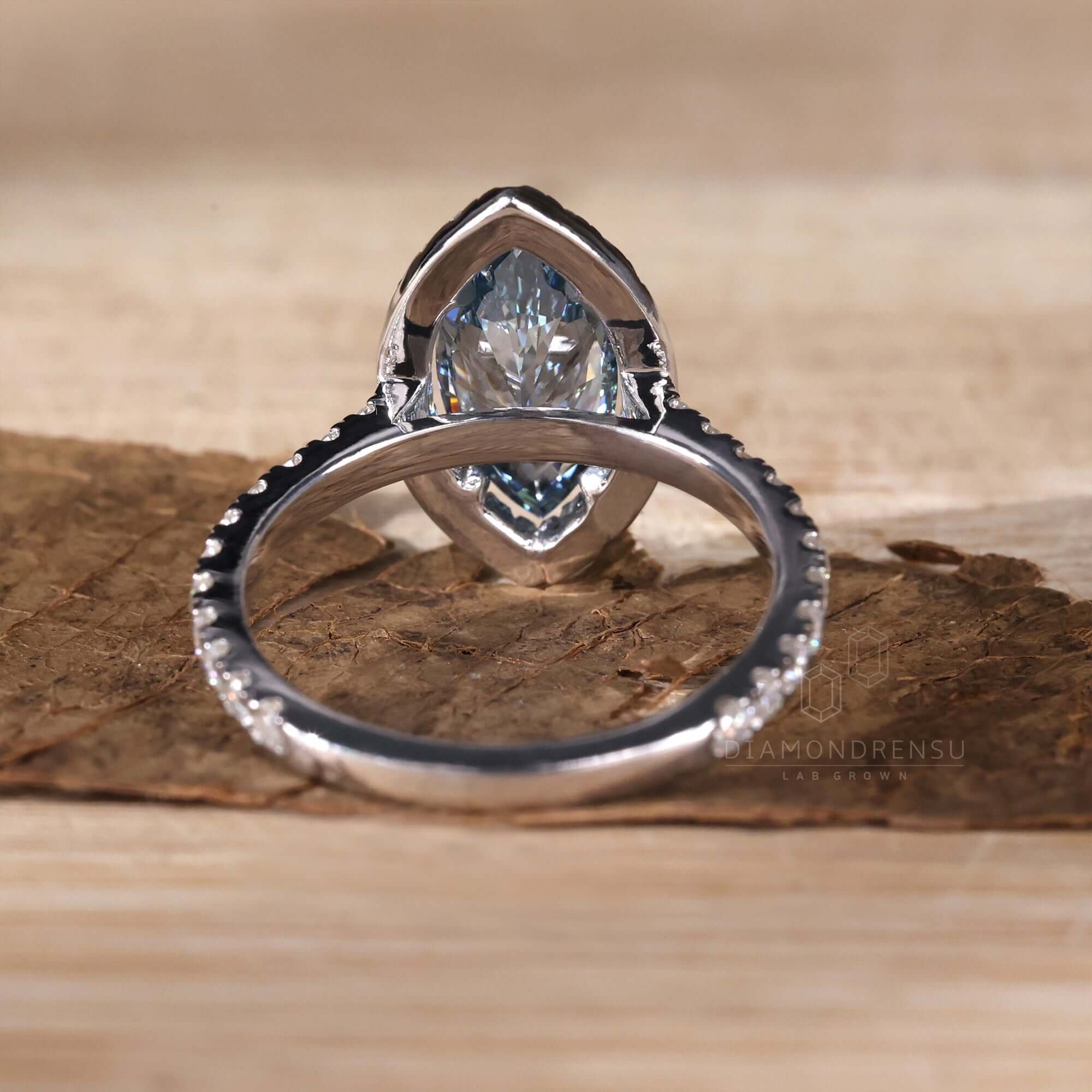 Marquise engagement ring showcasing a marquise cut and intricate pave diamonds.
