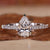 Elegant pear halo engagement ring with sparkling details. Elegant pear halo engagement ring with sparkling details.