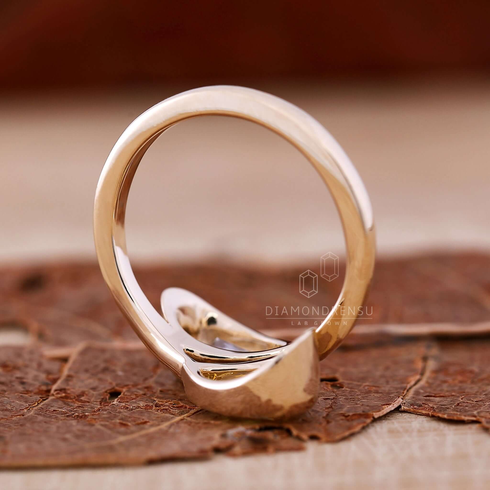 Gorgeous pear diamond ring in a luxurious setting.