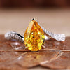 Pear shaped ring diamond in a stunning bypass ring design