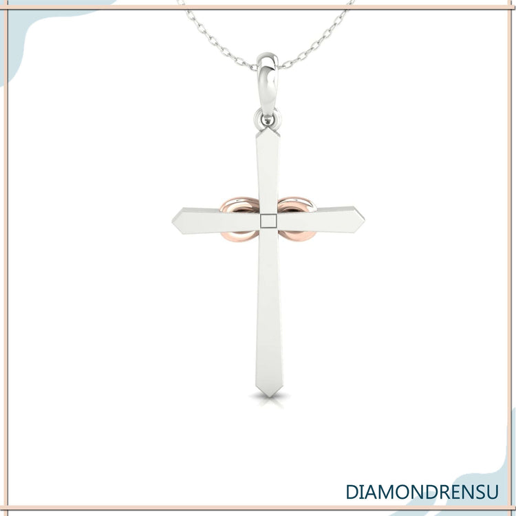 Gold diamond pendant in classic cross design.
